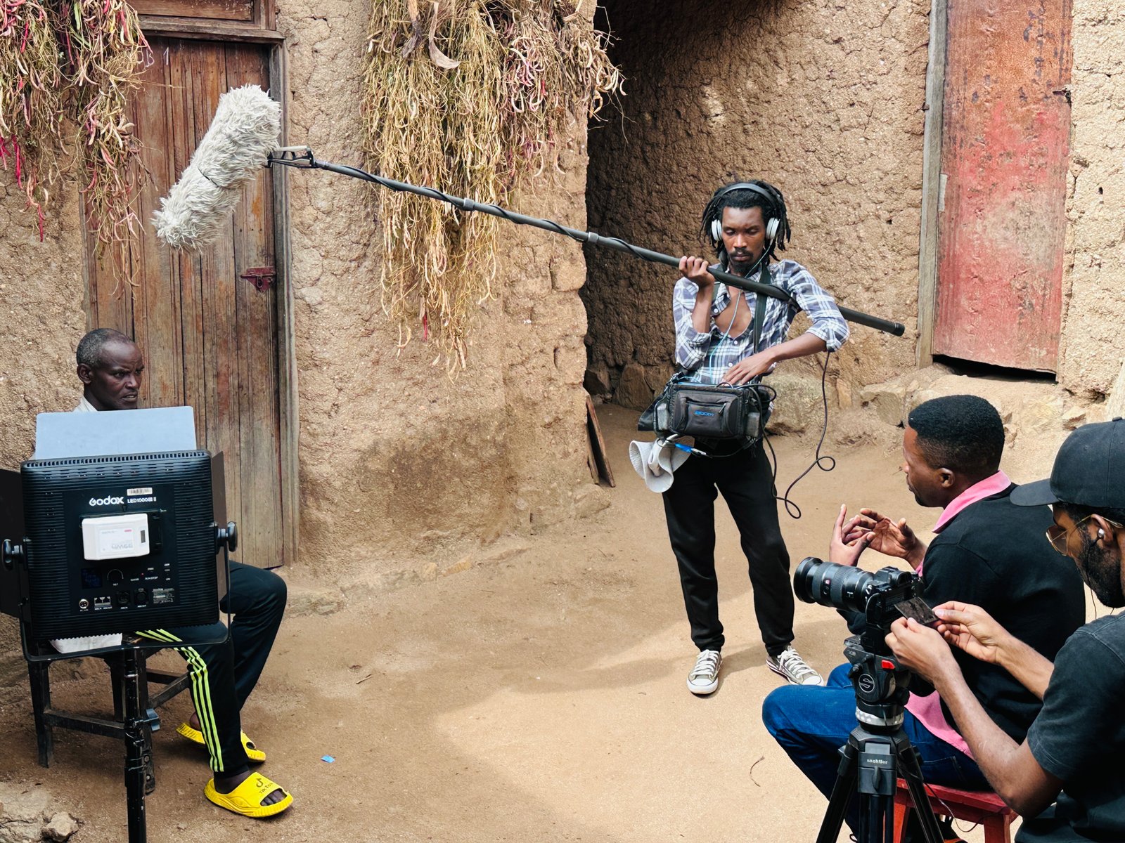 Documentary crew filming on location, I Killed a Husband of My Friend